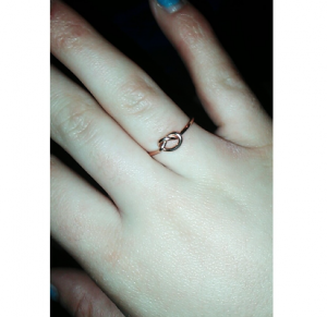 A love knot, a promise ring. Promises love for another. 