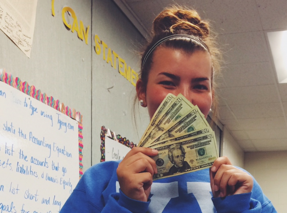 student with money